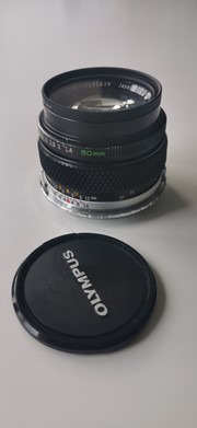 Olympus OM Zuiko Auto-S 50mm f/1.4 met EOS adapter