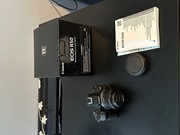 Canon EOS R50 camera + RF-S 18-45 Kit lens