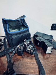 Minolta 5000 AF Spiegelreflexcamera met flitser