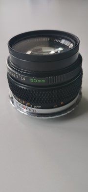 Olympus OM Zuiko Auto-S 50mm f/1.4 met EOS adapter