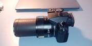 LUMIX FZ1000 COMPACT MET 3 LADERS & 6 ACCUS
