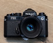 Nikon FE analoge camera met telezoom 80-200mm